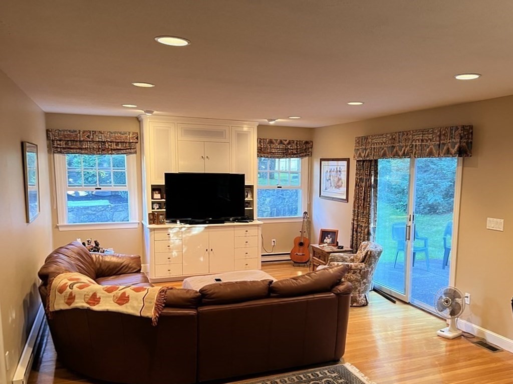 15 Leo Road Marblehead, MA 01945 - Photo 9 of 21 a living room with furniture and a flat screen tv