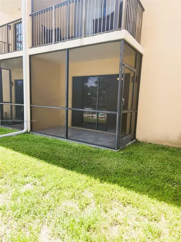 a house with garden in front of it