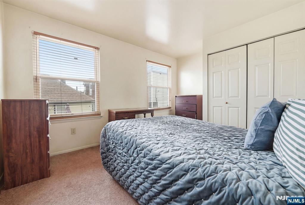 120 Carnegie Place Union, NJ 07088 - Photo 11 of 28 a bedroom with a bed and a window