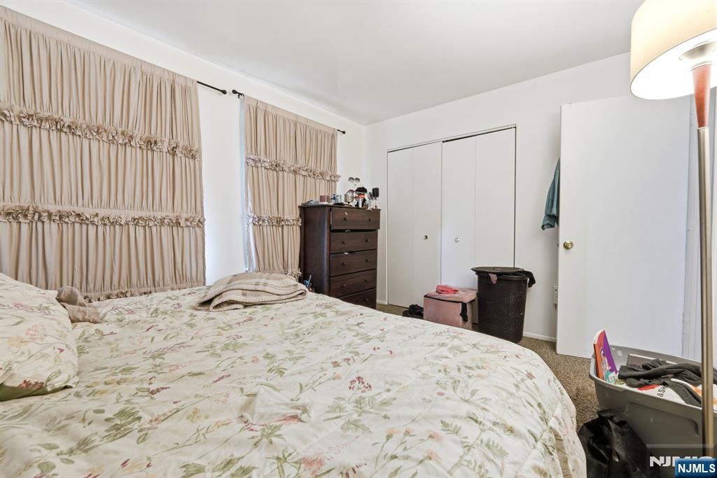 120 Carnegie Place Union, NJ 07088 - Photo 14 of 28 a bedroom with a bed and a closet