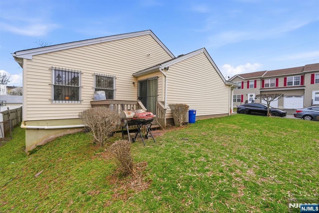 120 Carnegie Place Union, NJ 07088 - Photo 24 of 28 a view of a house with a yard and sitting area