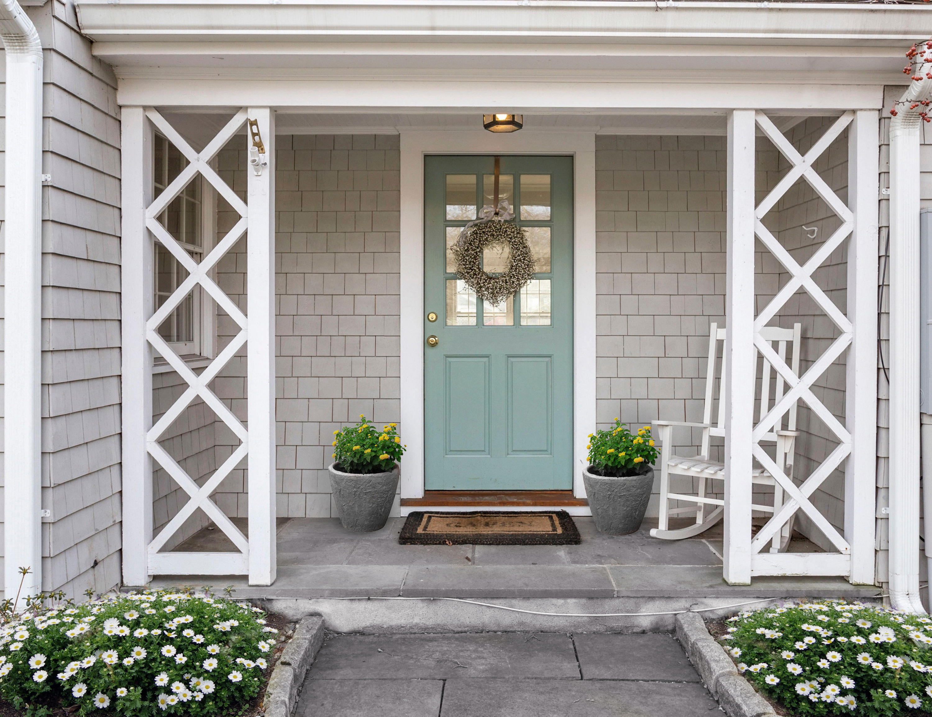 204 Middlesex Road Darien, CT 06820 - Photo 2 of 23 a view of front door of house and potted plants