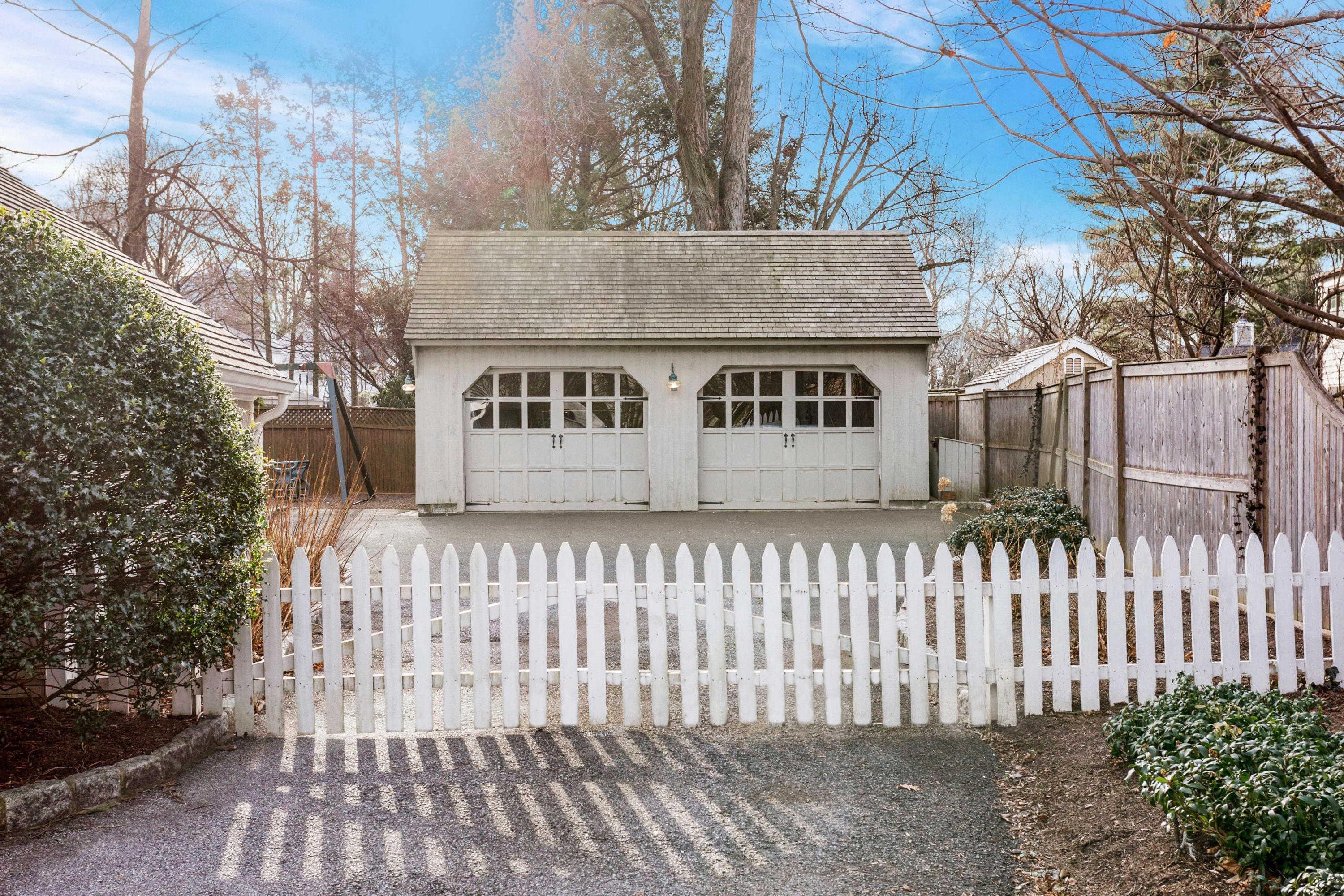 204 Middlesex Road Darien, CT 06820 - Photo 21 of 23 a front view of a house with a garden