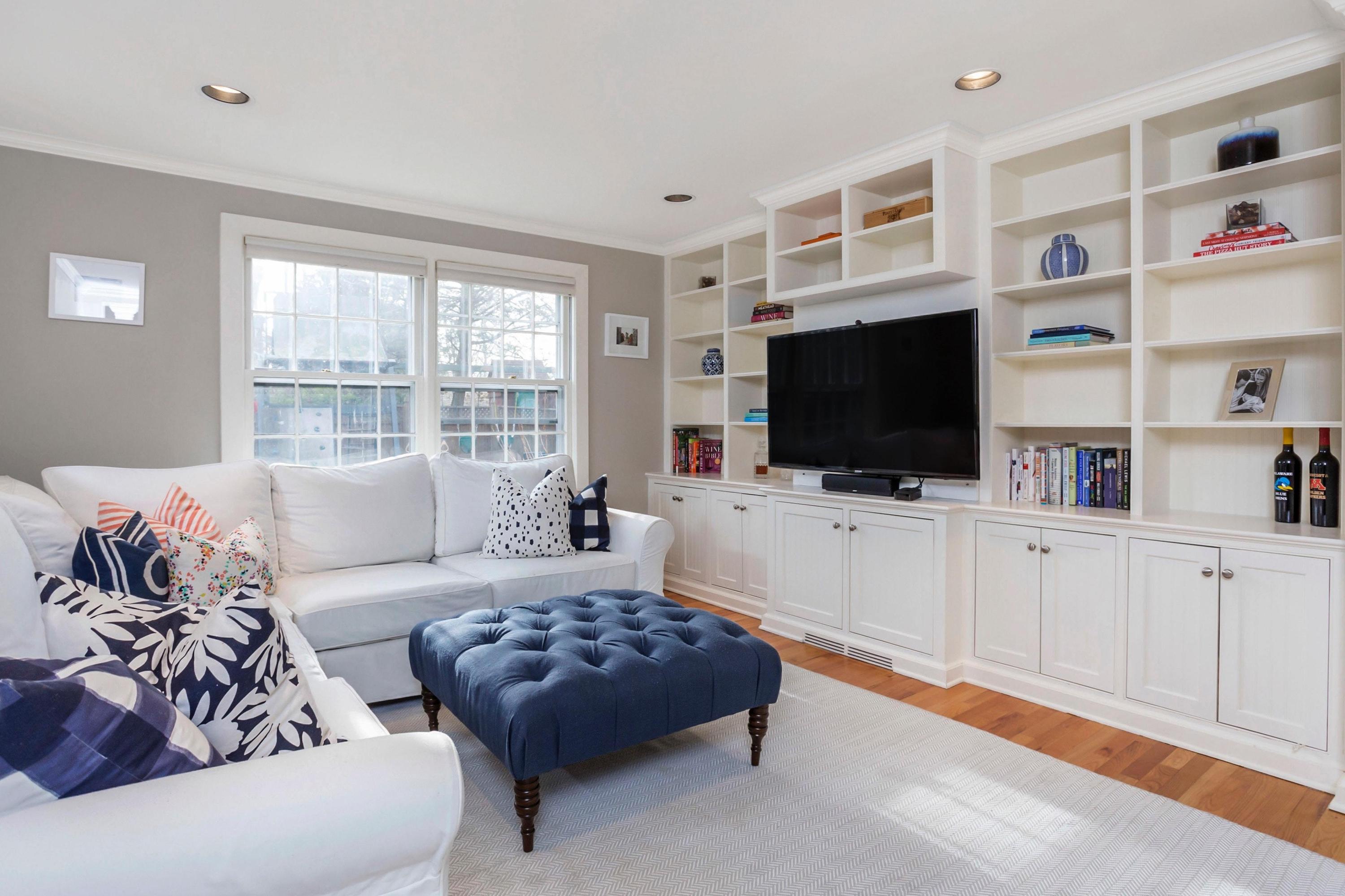 204 Middlesex Road Darien, CT 06820 - Photo 5 of 23 a living room with furniture and a flat screen tv