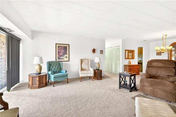 a living room with furniture and a couch