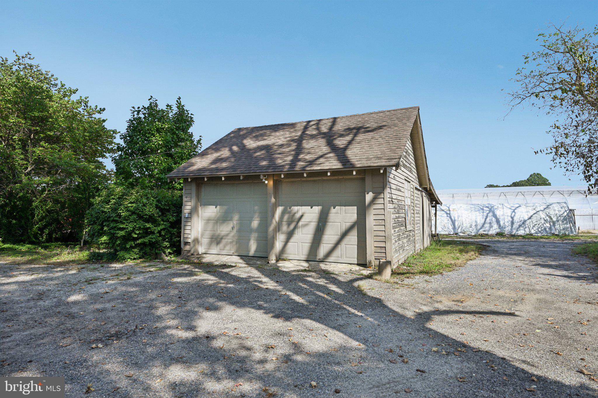 1001 South West Avenue Vineland, NJ 08360 - Photo 27 of 61 a view of a wooden house with large trees