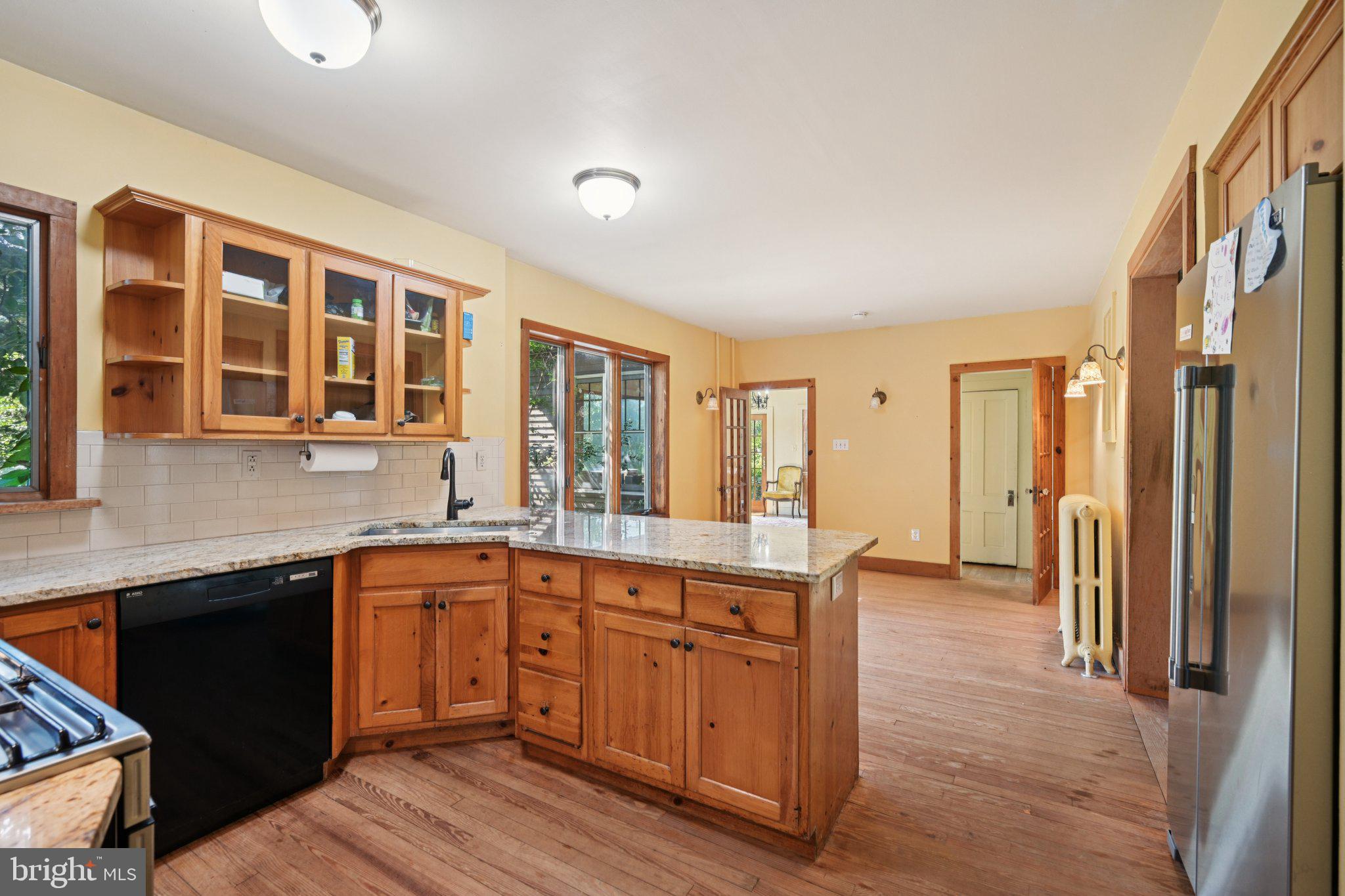 1001 South West Avenue Vineland, NJ 08360 - Photo 29 of 61 a large kitchen with stainless steel appliances granite countertop a sink and cabinets