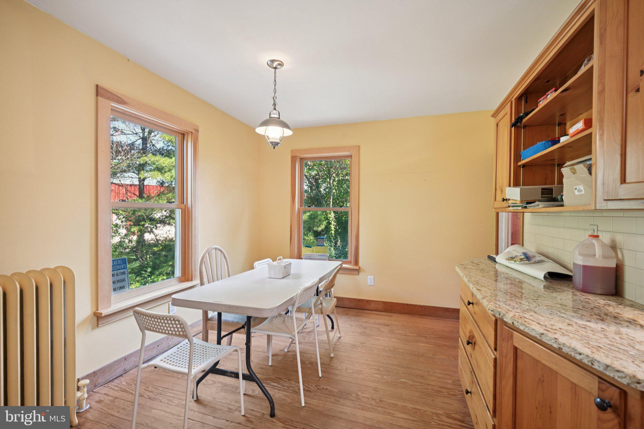 1001 South West Avenue Vineland, NJ 08360 - Photo 31 of 61 a view of a dining room with furniture window and wooden floor