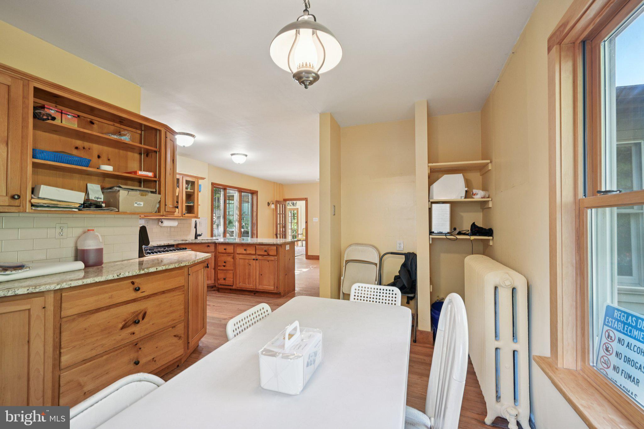 1001 South West Avenue Vineland, NJ 08360 - Photo 32 of 61 a kitchen with a refrigerator and a sink