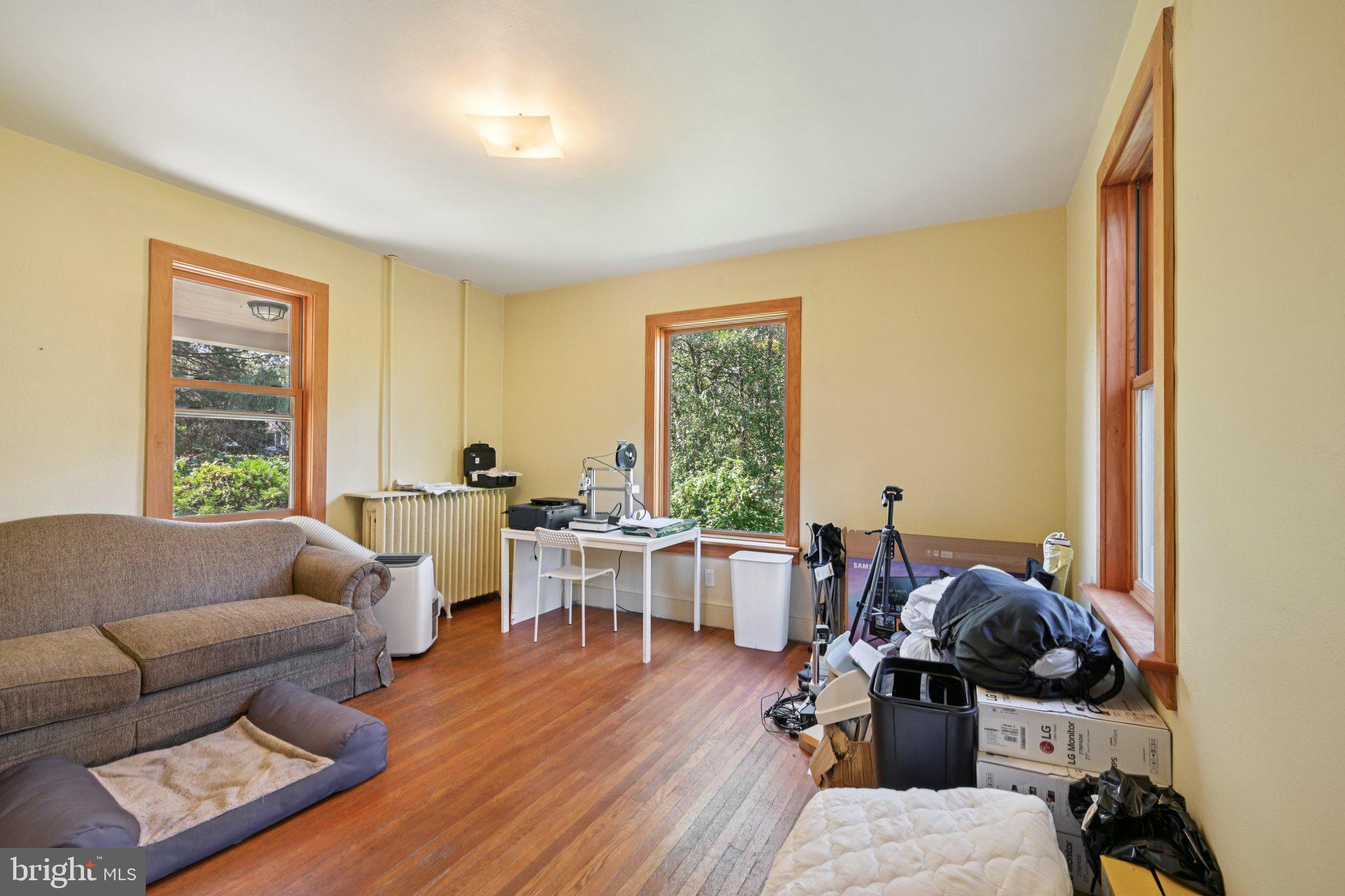 1001 South West Avenue Vineland, NJ 08360 - Photo 37 of 61 a living room with furniture and a large window