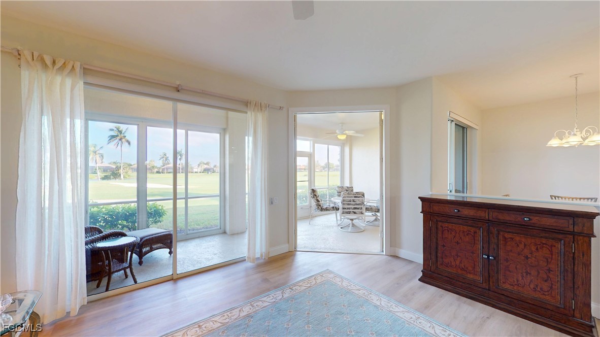 9130 Bayberry Bend, Unit 102 Fort Myers, FL 33908 - Photo 12 of 44 a living room with furniture and a large window