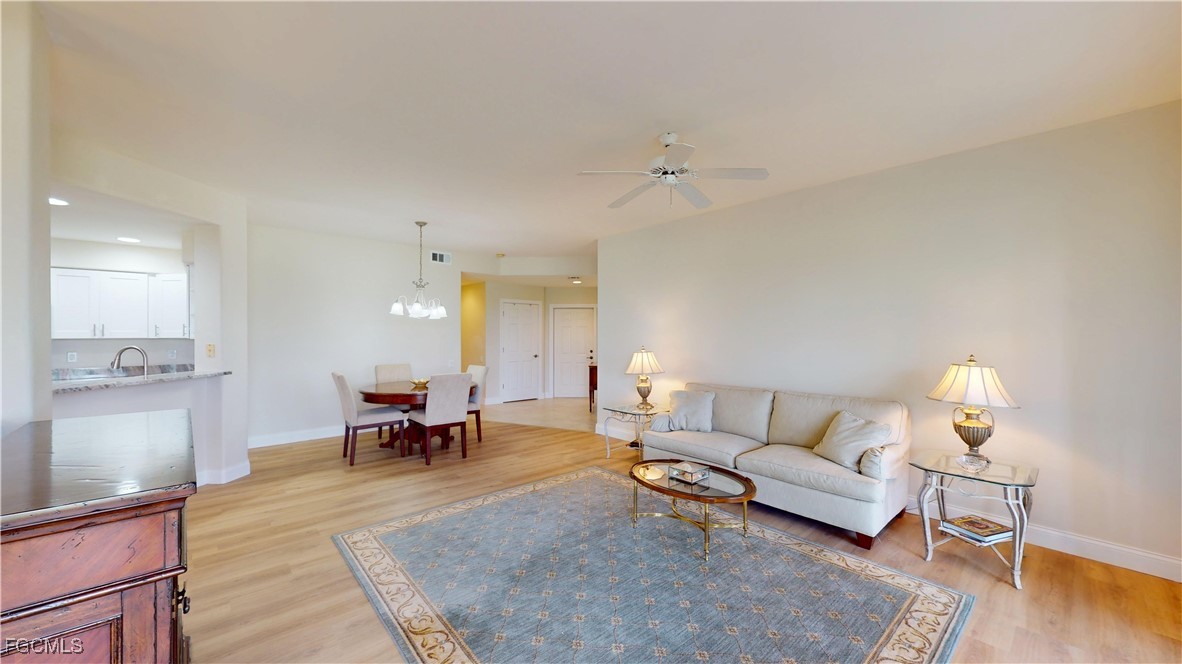 9130 Bayberry Bend, Unit 102 Fort Myers, FL 33908 - Photo 4 of 44 a living room with furniture and a table