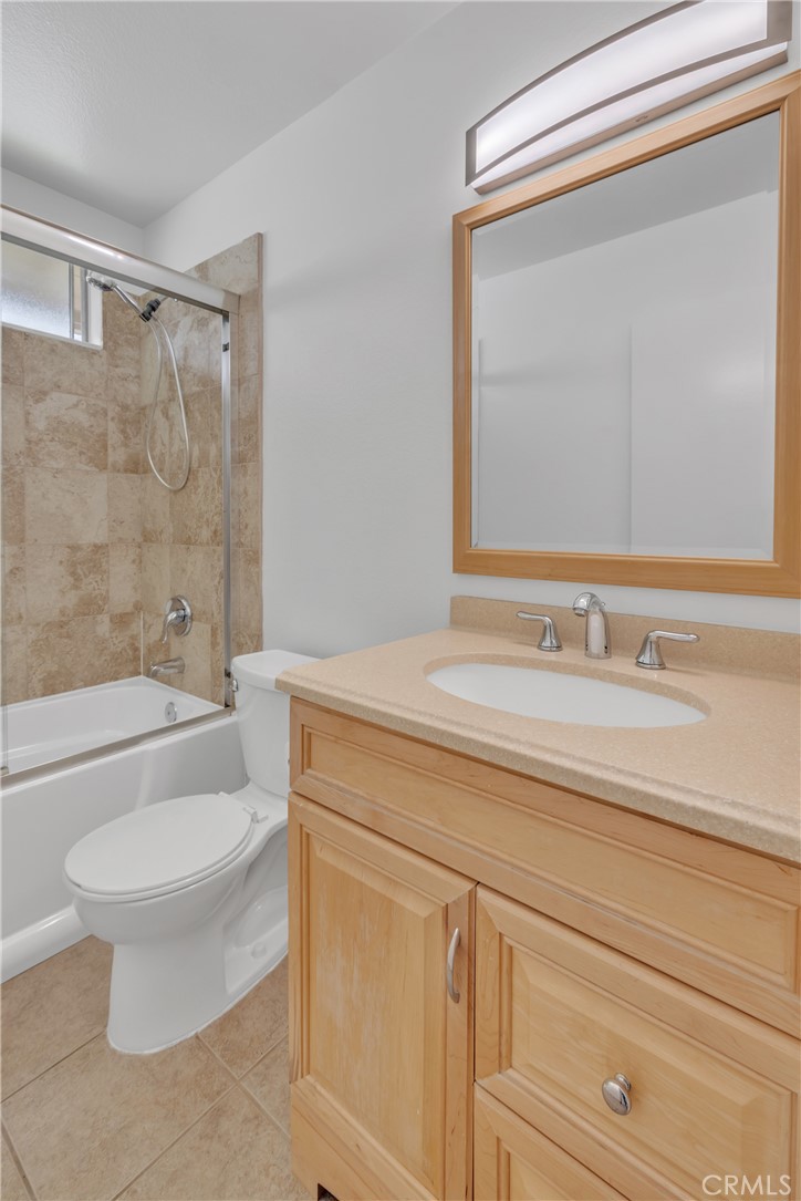 45 Orchard Irvine, CA 92618 - Photo 12 of 29 a bathroom with a sink a toilet and shower