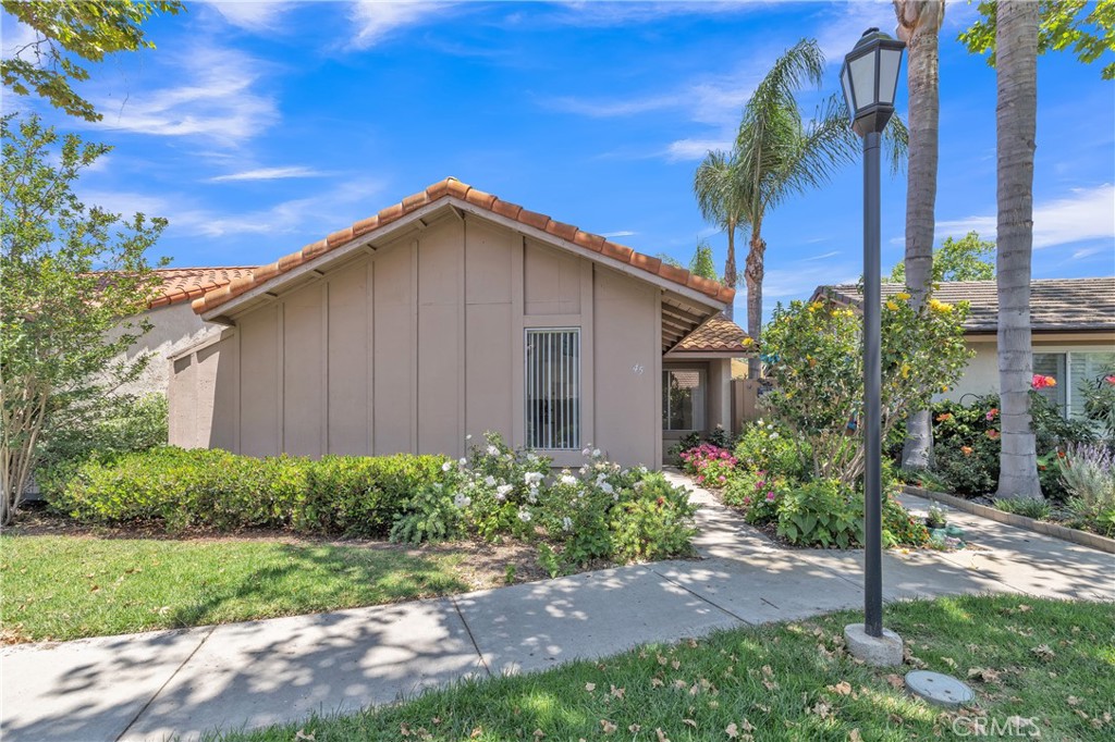 45 Orchard Irvine, CA 92618 - Photo 22 of 29 a backyard of a house with plants and outdoor space