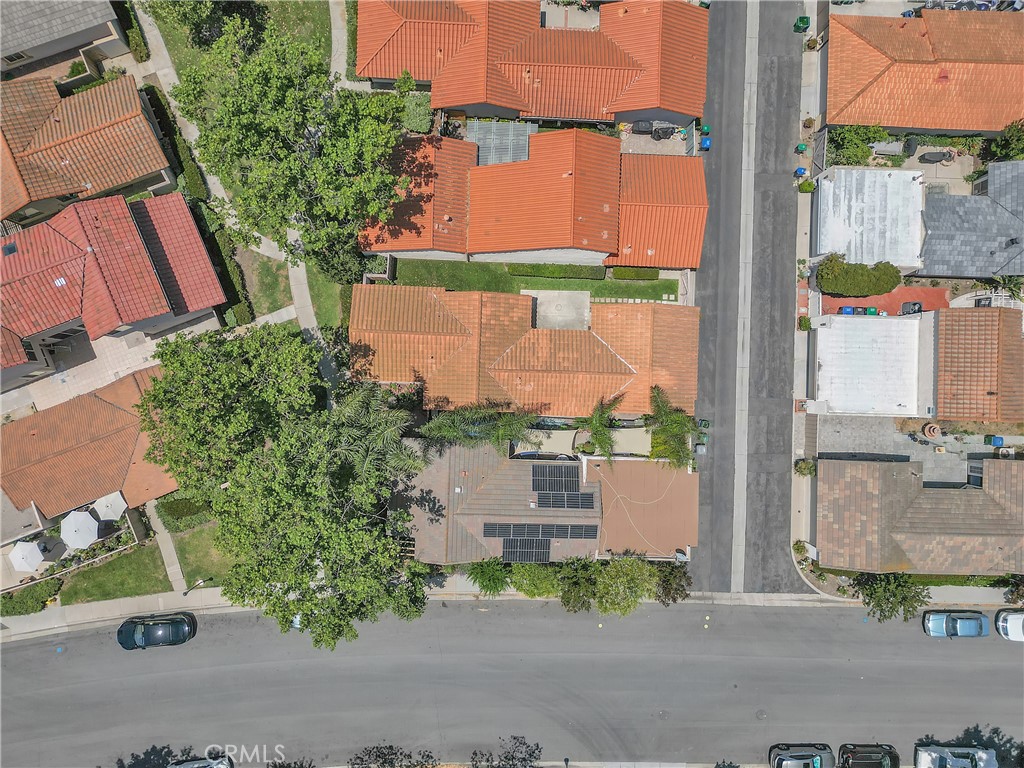 45 Orchard Irvine, CA 92618 - Photo 24 of 29 an aerial view of a house with a yard and a garage