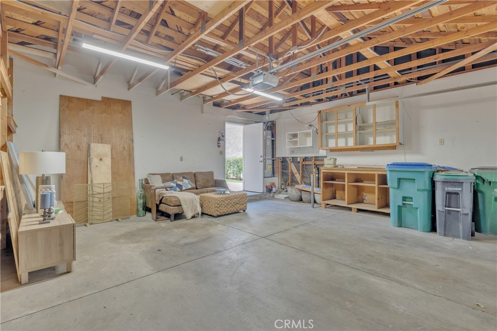 45 Orchard Irvine, CA 92618 - Photo 28 of 29 a living room with furniture and a chandelier