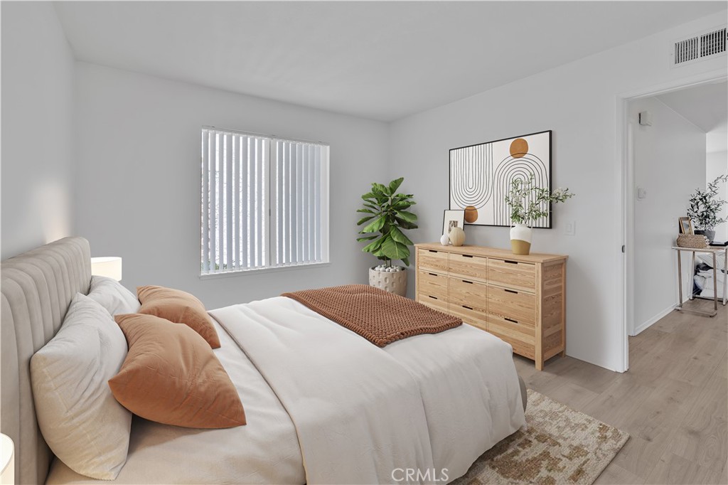 45 Orchard Irvine, CA 92618 - Photo 6 of 29 a bedroom with a bed and a dresser