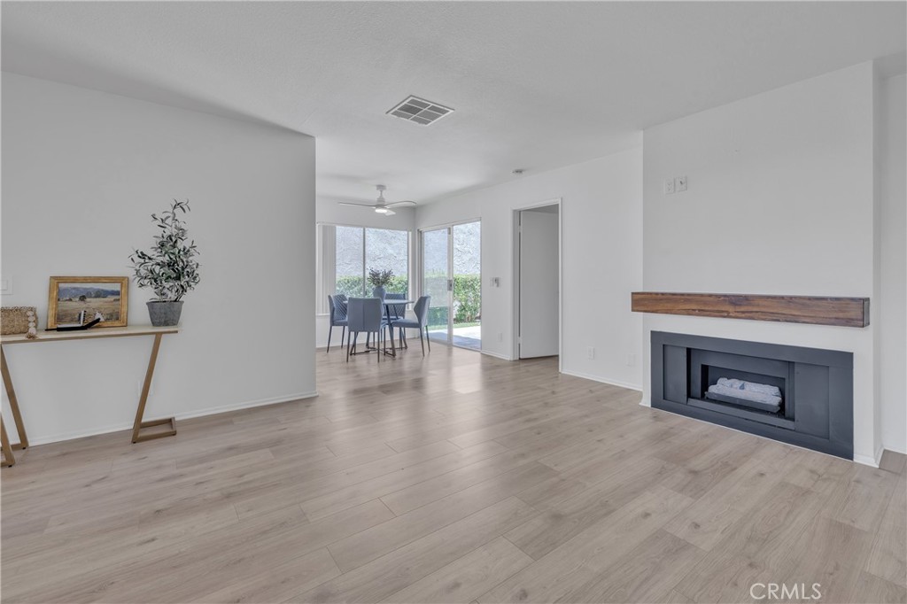 45 Orchard Irvine, CA 92618 - Photo 8 of 29 a view of a livingroom with furniture and a fireplace