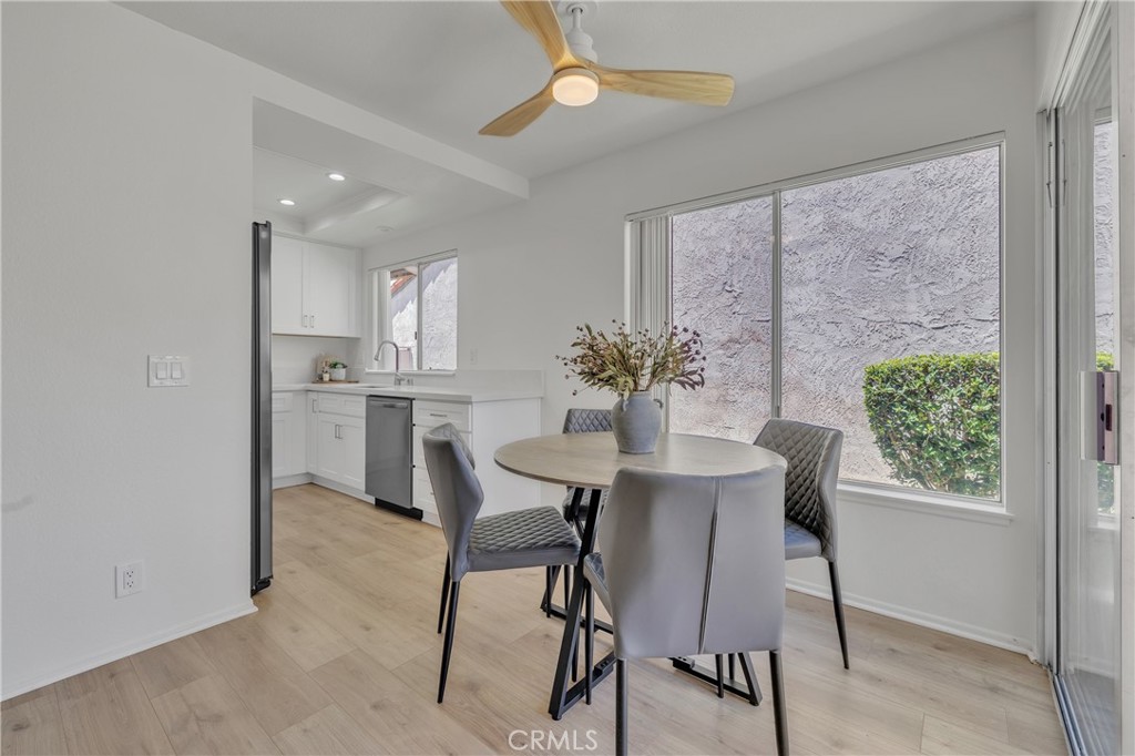 45 Orchard Irvine, CA 92618 - Photo 9 of 29 a view of a dining room with furniture window and wooden floor