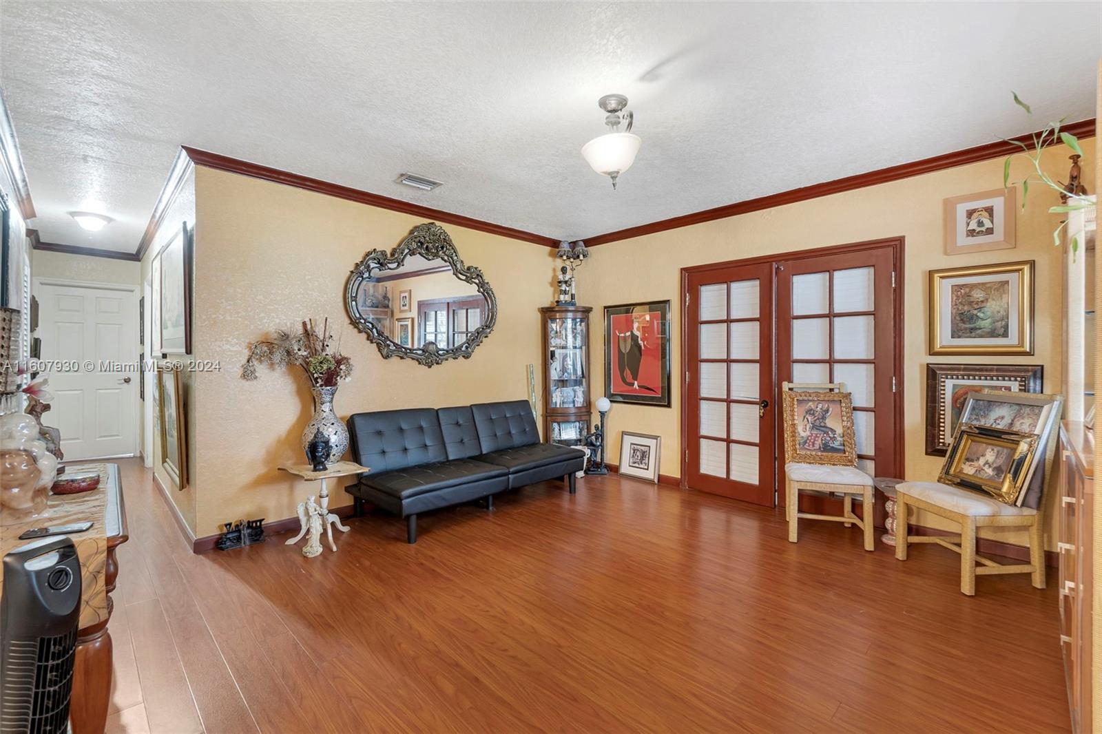 3015 Southwest 103rd Place Miami, FL 33165 - Photo 8 of 32 a living room with furniture and a table