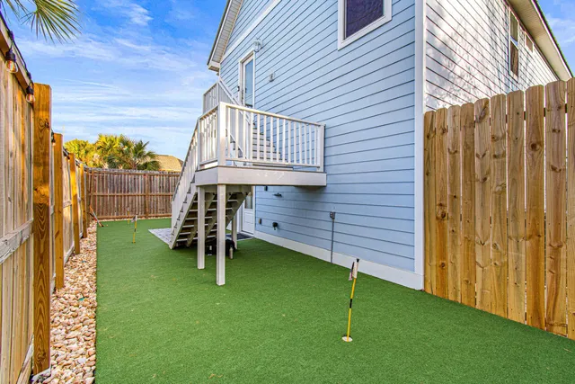 a view of swimming pool with outdoor seating