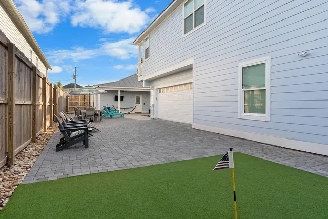 a house view with a garden space