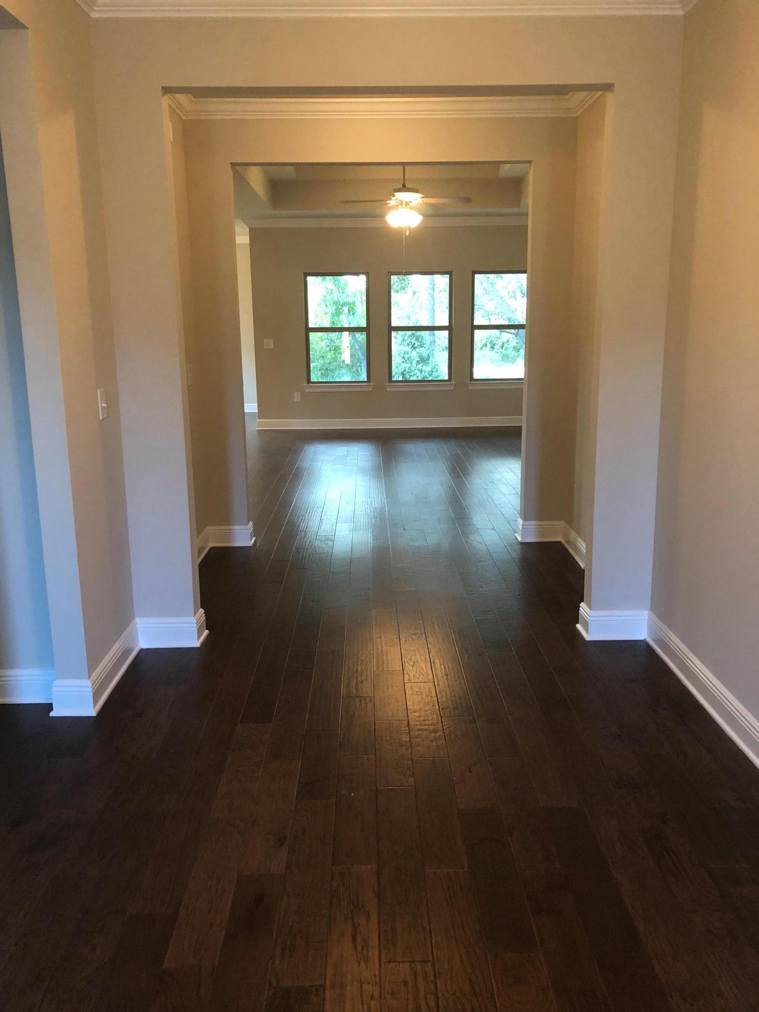 157 Wayne Trail Santa Rosa Beach, FL 32459 - Photo 10 of 17 wooden floor in an empty room with a window
