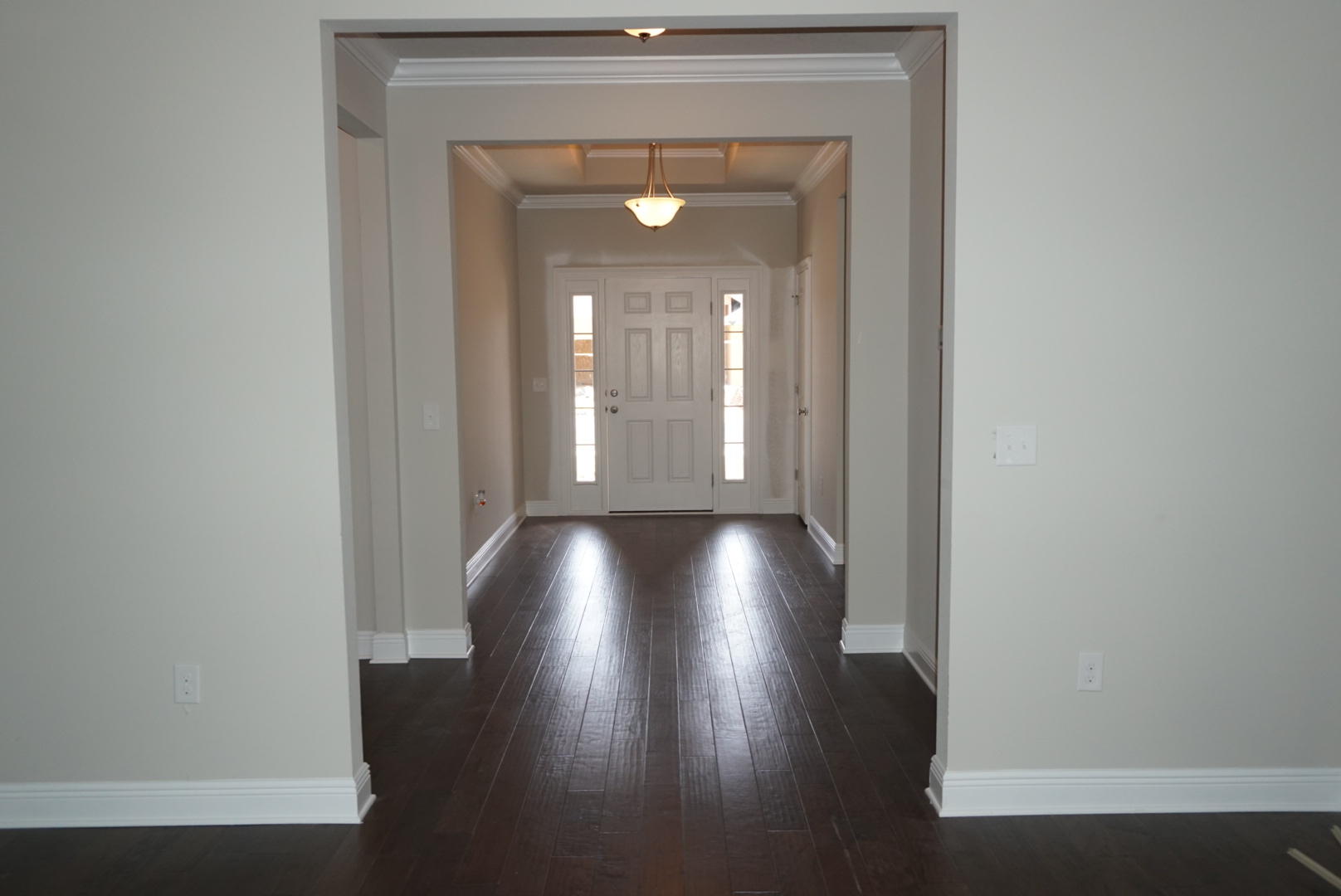 157 Wayne Trail Santa Rosa Beach, FL 32459 - Photo 7 of 17 a view of a hallway with wooden floor