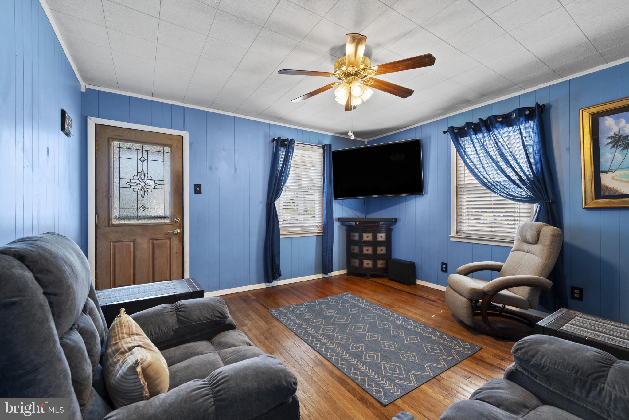 1311 Willow Road Baltimore, MD 21222 - Photo 5 of 33 a living room with furniture a ceiling fan and a window