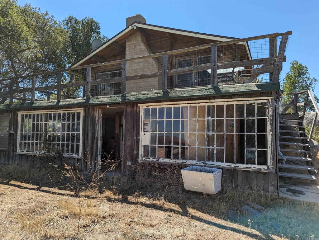 3910 Carveacre Road Alpine, CA 91901 - Photo 17 of 20 a front view of a house with garden