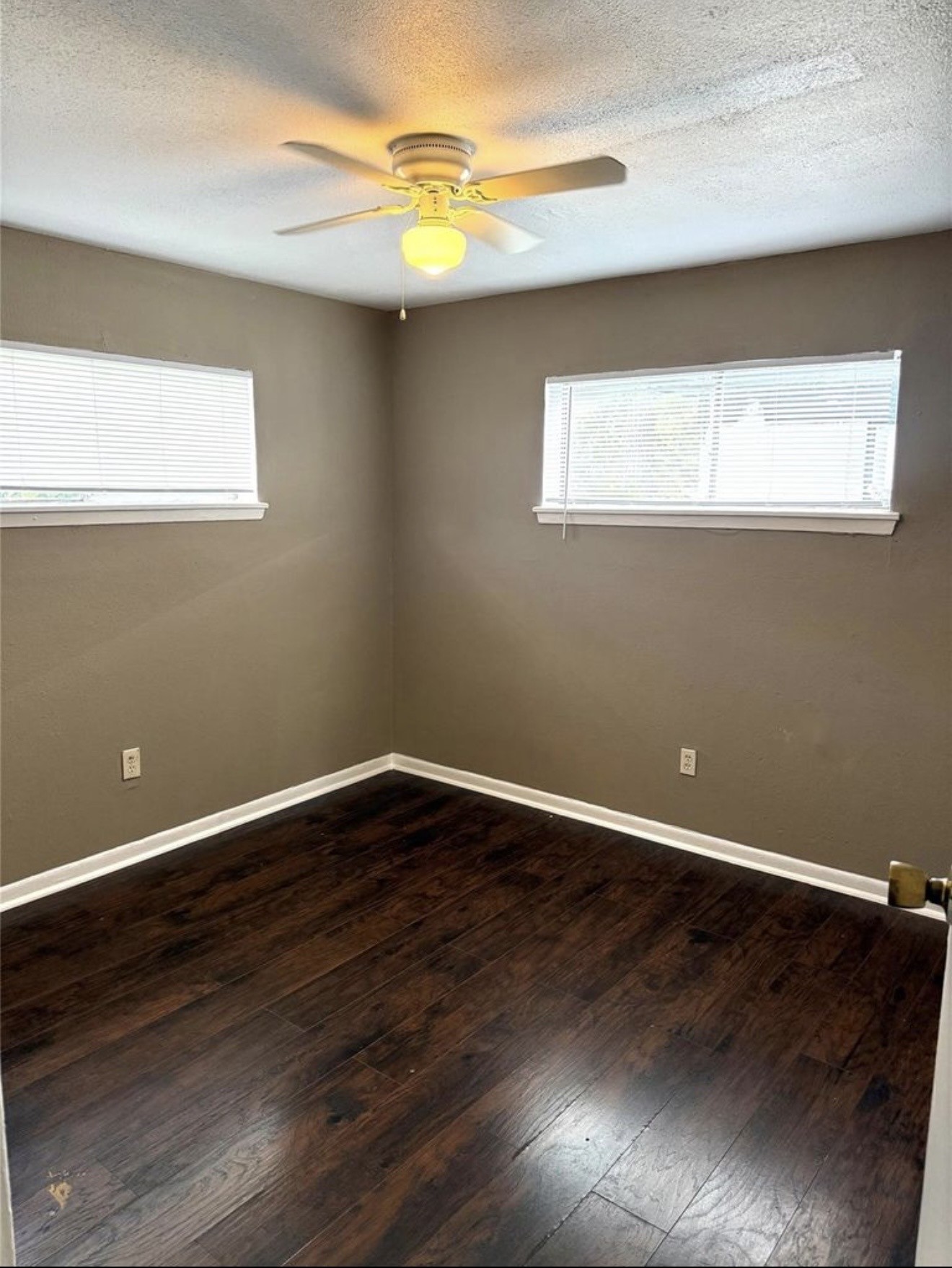 5412 Market Street, Unit 3 Houston, TX 77020 - Photo 7 of 11 a view of an empty room with wooden floor and a window