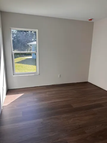 a front view of a house with yard