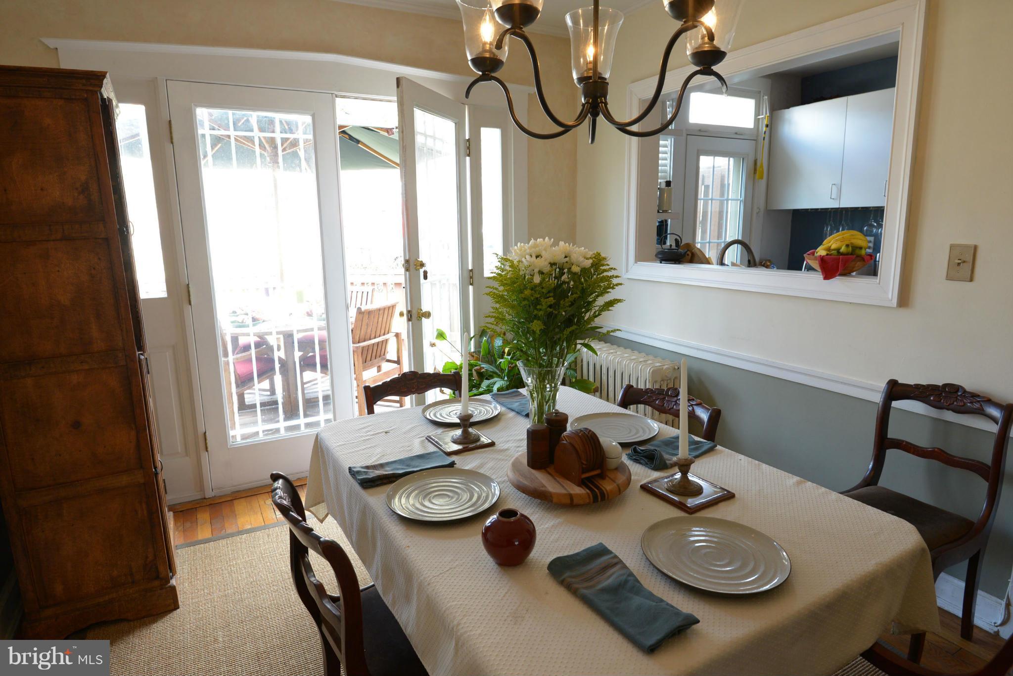 4453 Q Street Northwest Washington, DC 20007 - Photo 11 of 30 Dining Room with double doors to the deck