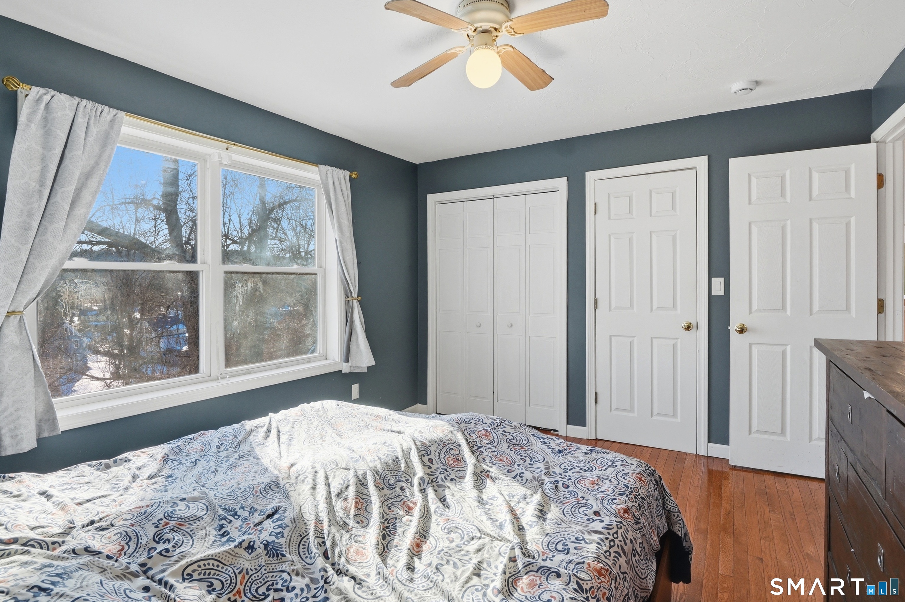 17 Vine Street Putnam, CT 06260 - Photo 18 of 35 a bedroom with a bed and a window