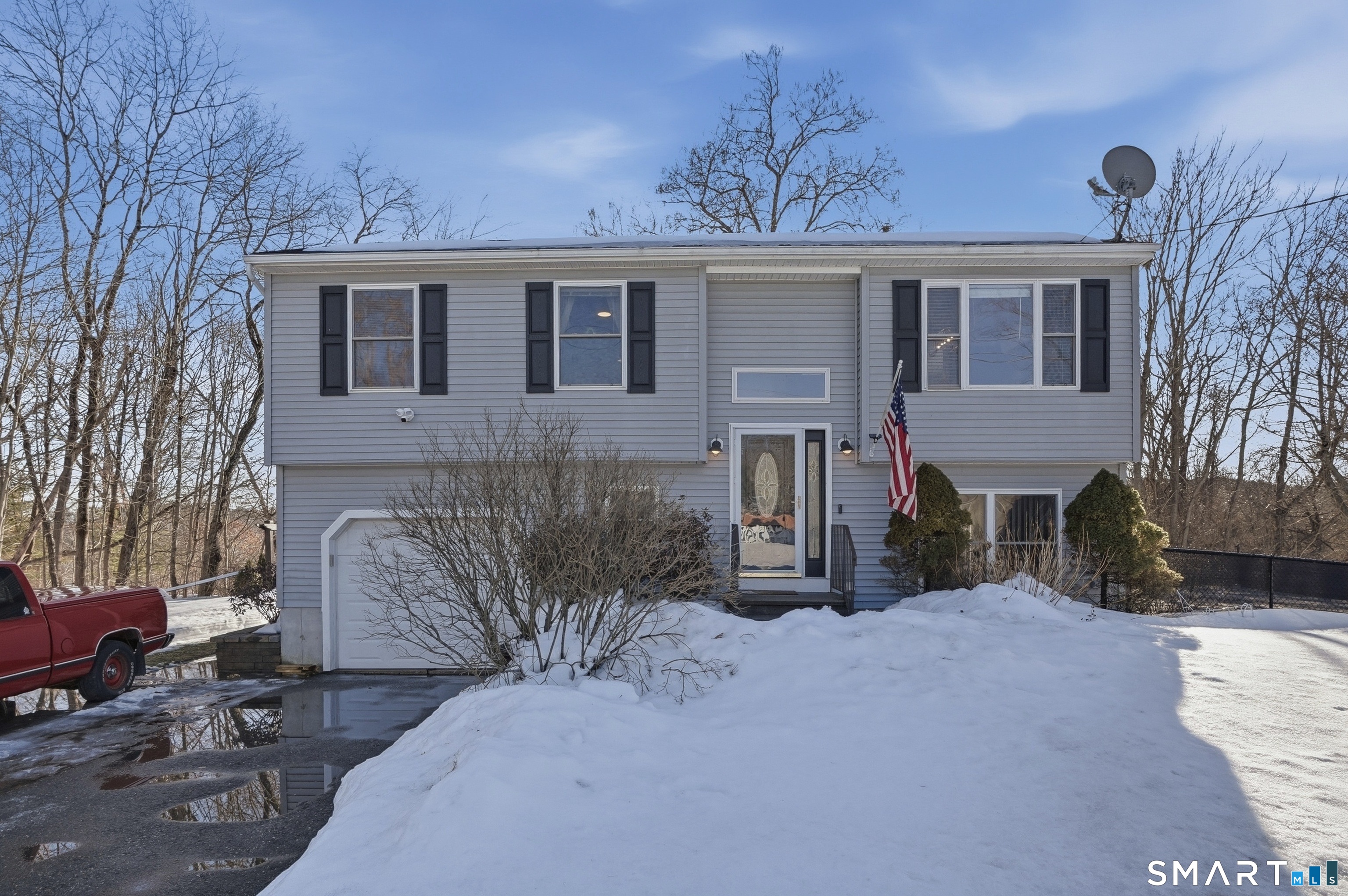 17 Vine Street Putnam, CT 06260 - Photo 2 of 35 a view of a house with a patio