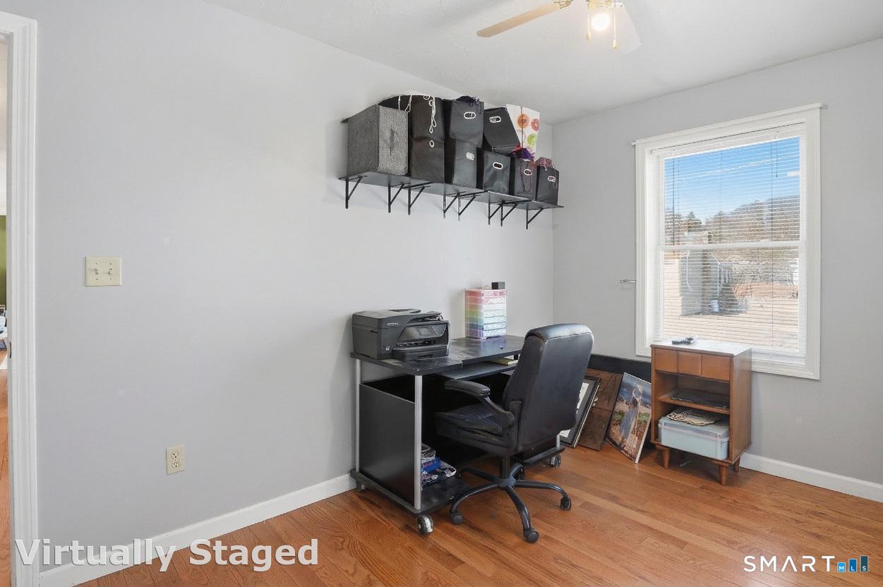 17 Vine Street Putnam, CT 06260 - Photo 21 of 35 a view of a workspace with furniture and a window