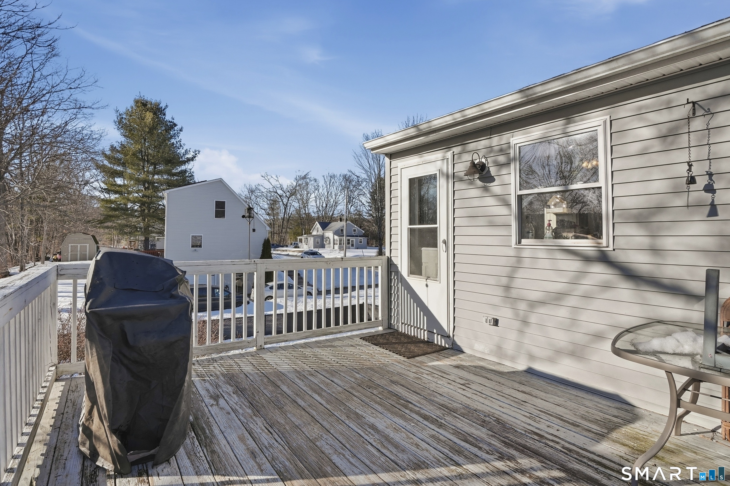 17 Vine Street Putnam, CT 06260 - Photo 29 of 35 a view of a deck with wooden floor and fence