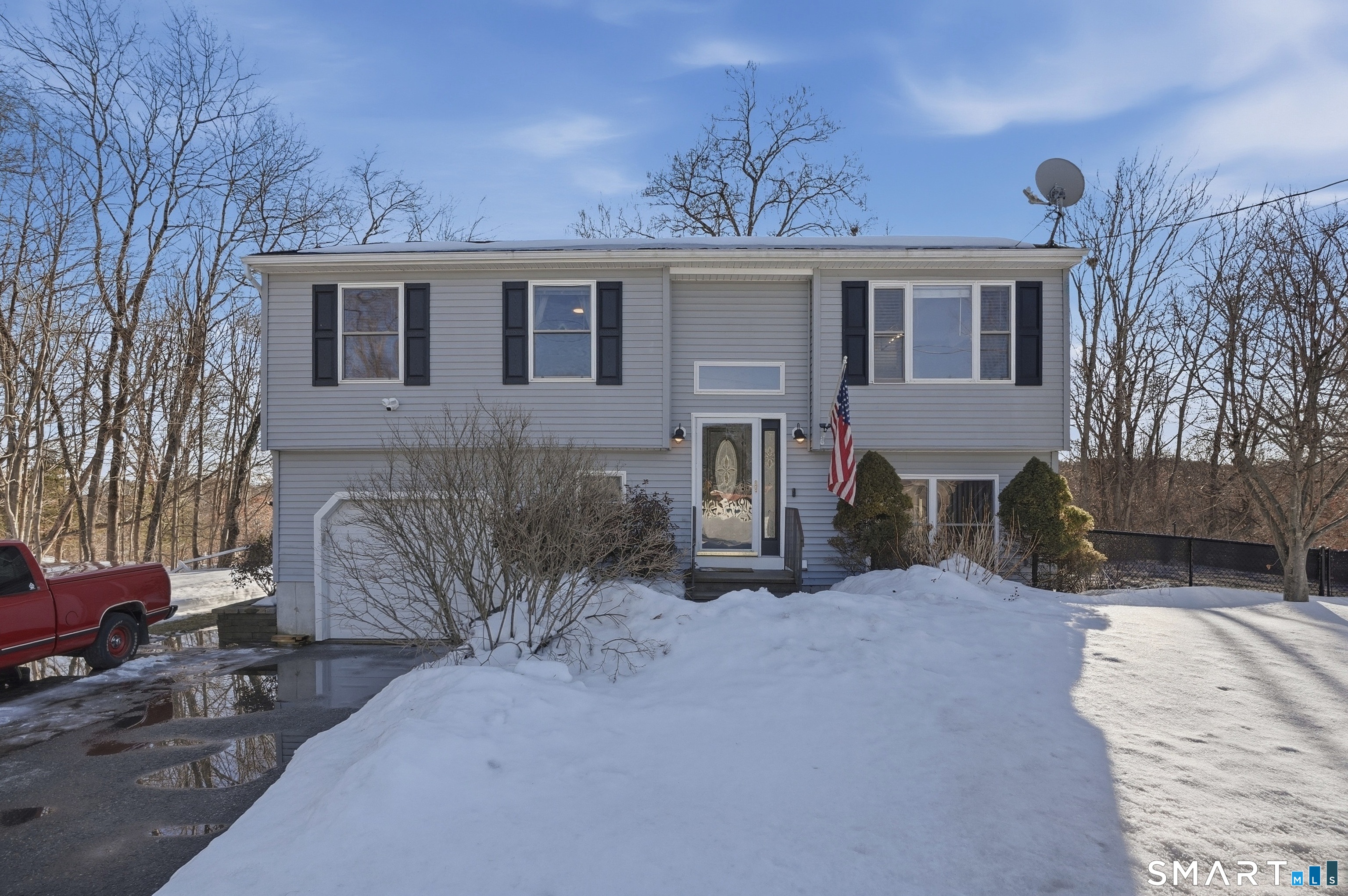 17 Vine Street Putnam, CT 06260 - Photo 31 of 35 a front view of a house with a yard