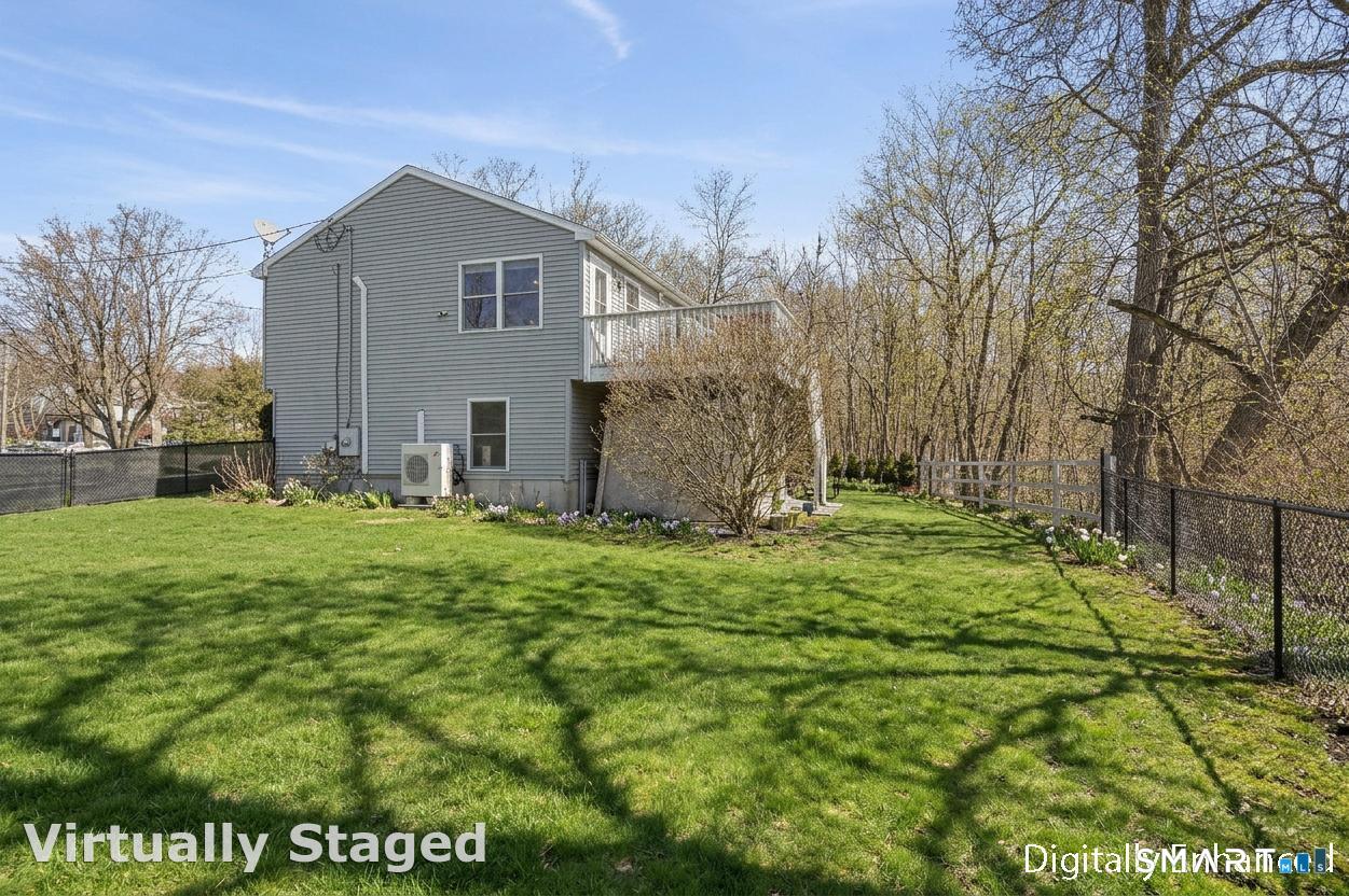 17 Vine Street Putnam, CT 06260 - Photo 33 of 35 a view of a backyard with large trees