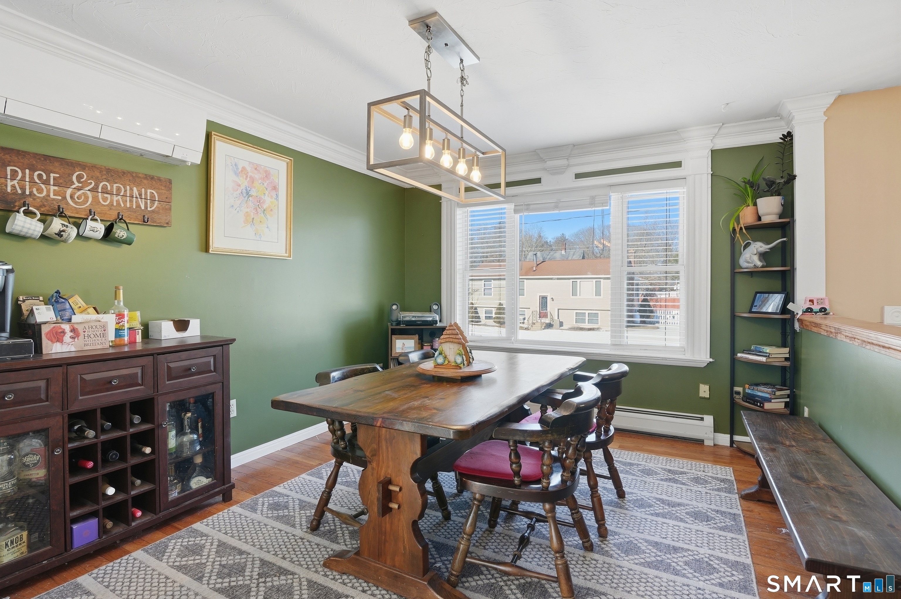 17 Vine Street Putnam, CT 06260 - Photo 9 of 35 a view of a dining room with furniture window and wooden floor
