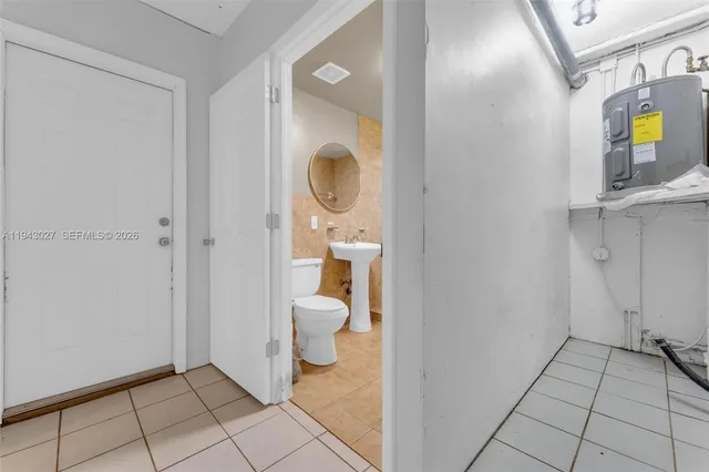 a bathroom with a toilet and a sink