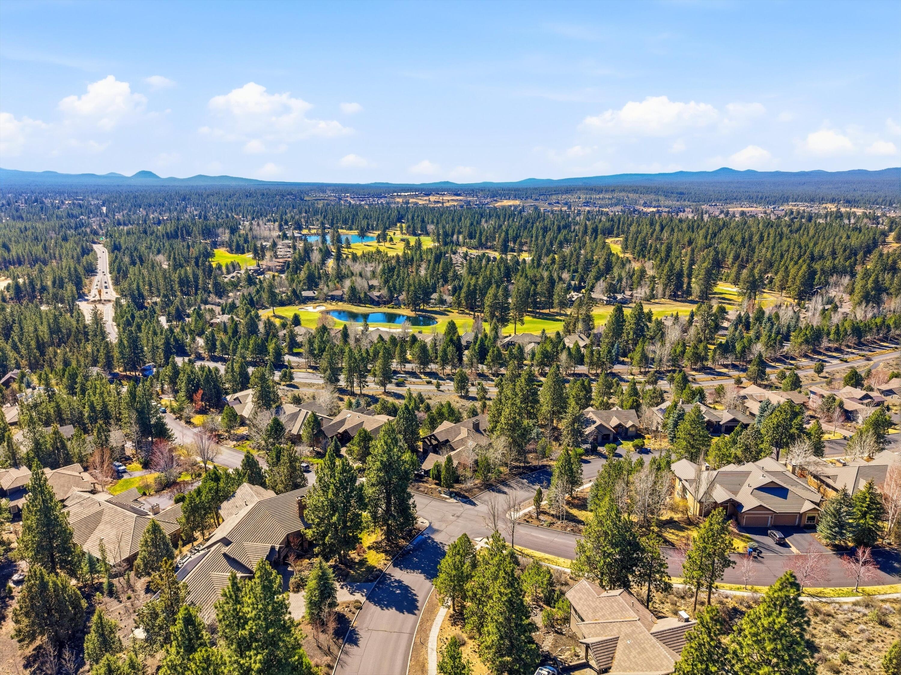 15 Southwest Quail Butte Place Bend, OR 97703 - Photo 43 of 55 an aerial view of residential building and city view