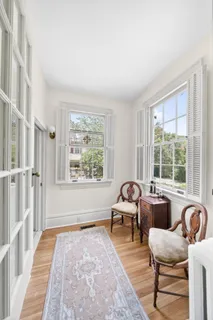 a living room with furniture and windows