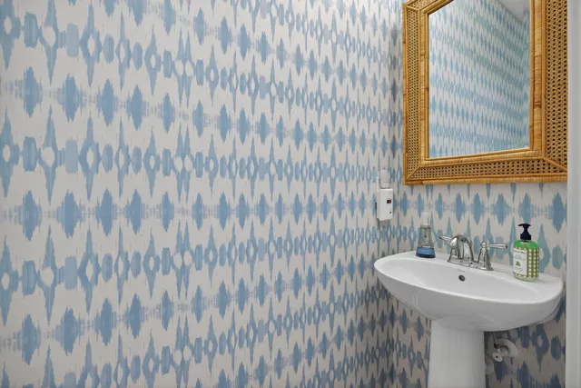 a view of storage and utility room with a sink