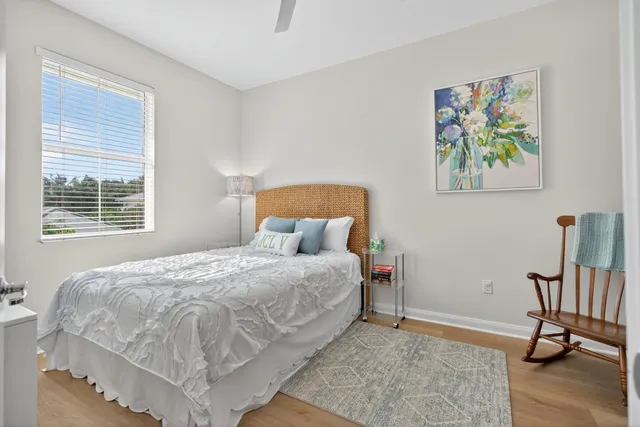 a view of an entryway with wooden floor