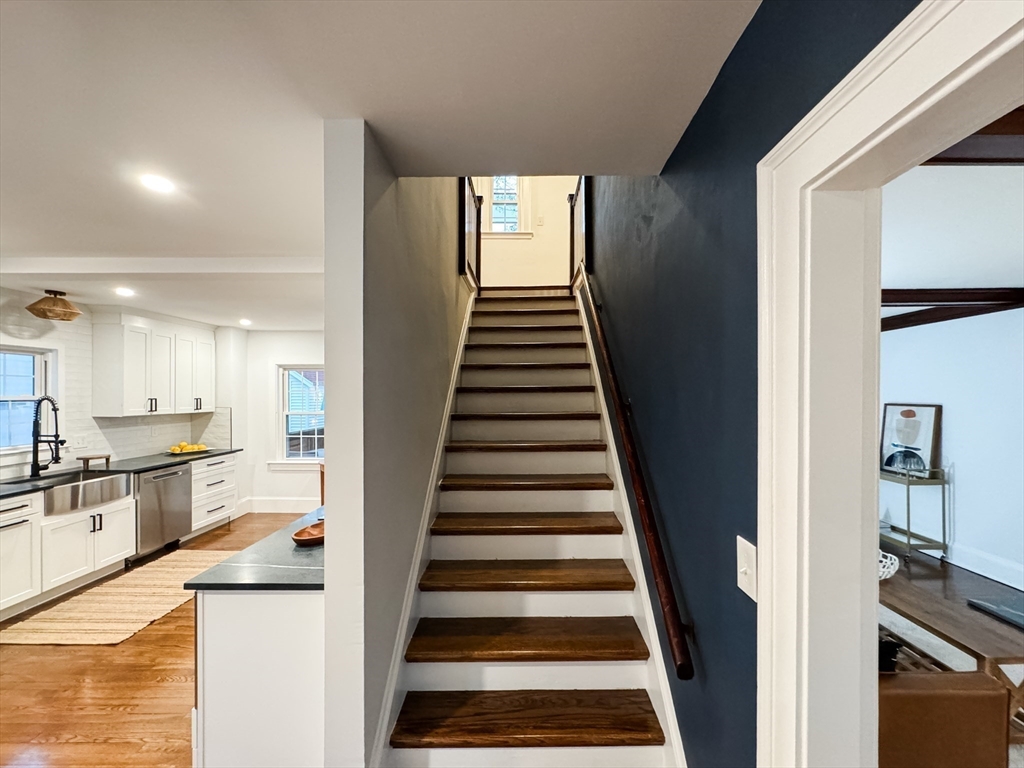 131 Damon Road Medford, MA 02155 - Photo 5 of 22 a view of a kitchen with wooden floor and electronic appliances