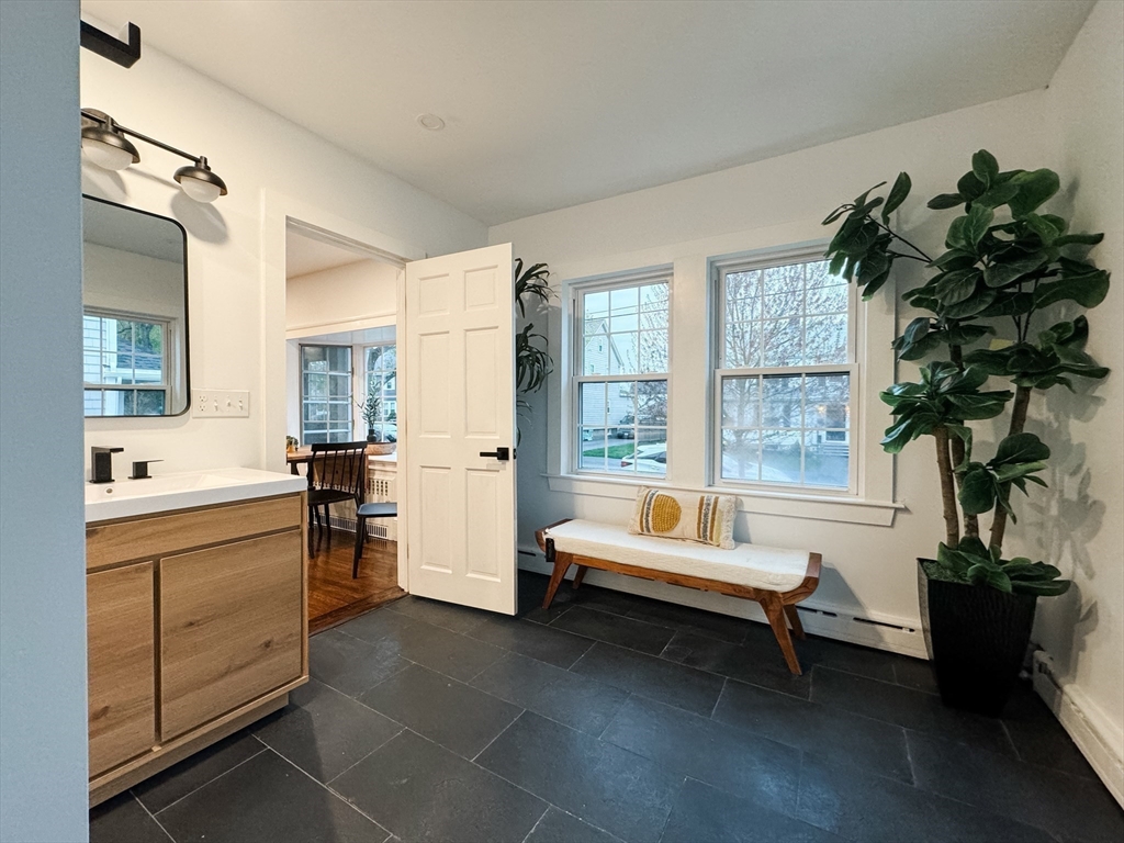 131 Damon Road Medford, MA 02155 - Photo 10 of 22 a living room with furniture and a potted plant