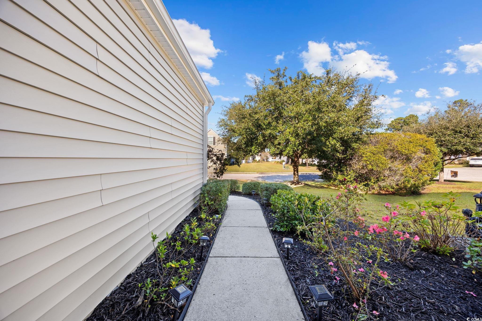 136 Carolina Oaks Drive Murrells Inlet, SC 29576 - Photo 32 of 40 Side garden