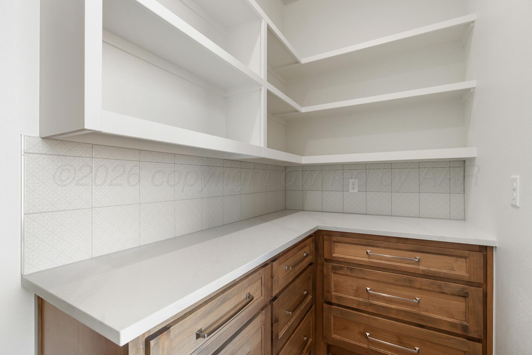 16551 Spring Lake Drive Canyon, TX 79015 - Photo 13 of 60 a view of storage and utility room