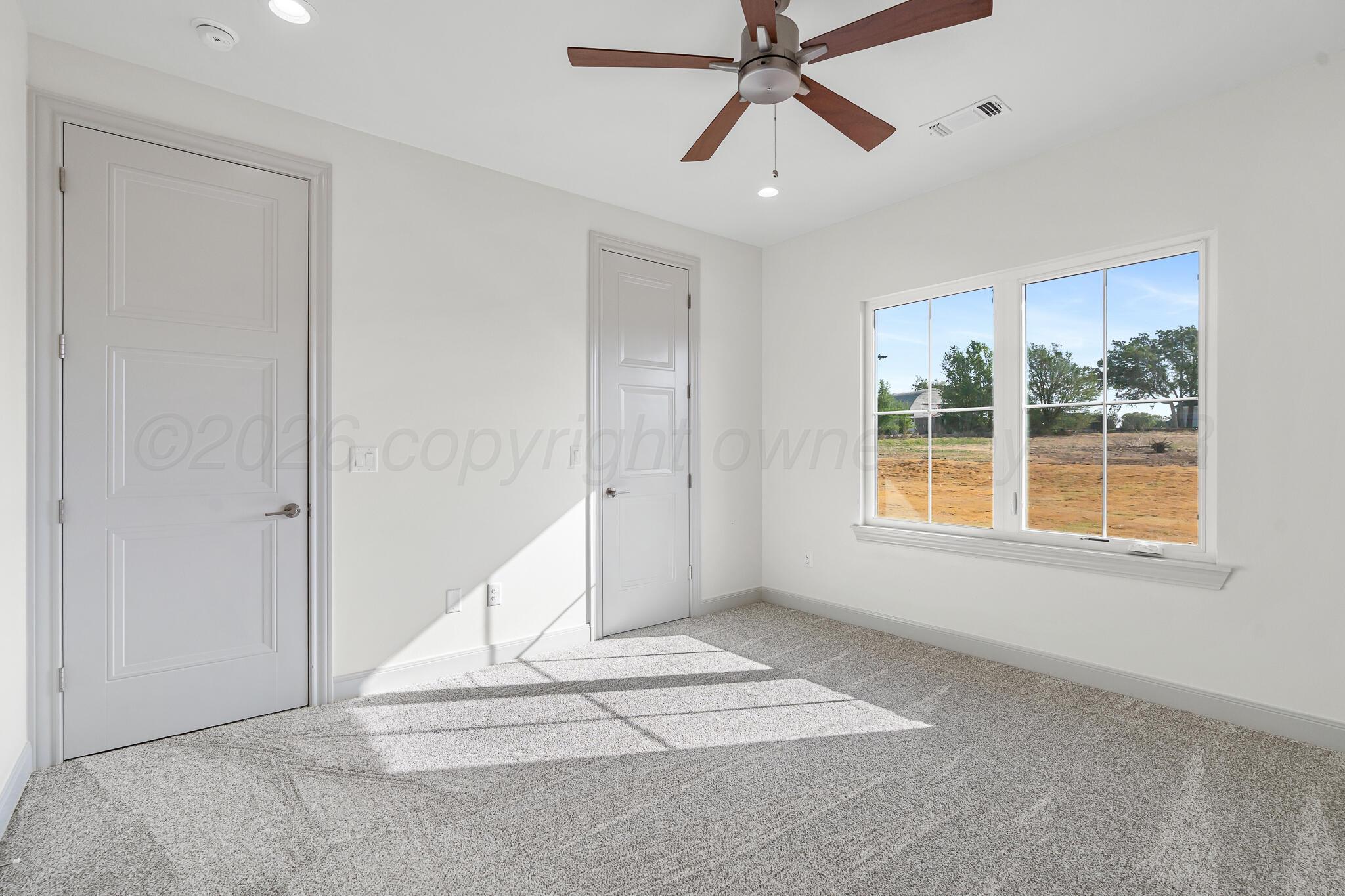 16551 Spring Lake Drive Canyon, TX 79015 - Photo 51 of 60 a view of an empty room with a window